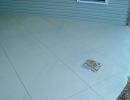 pif scored stained concrete with tile inset